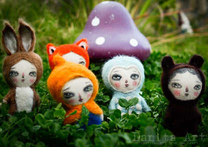 An amazing collection of hand crafted needle felting fabric and wool art dolls by the amazing mixed media artist and doll maker Danita Art