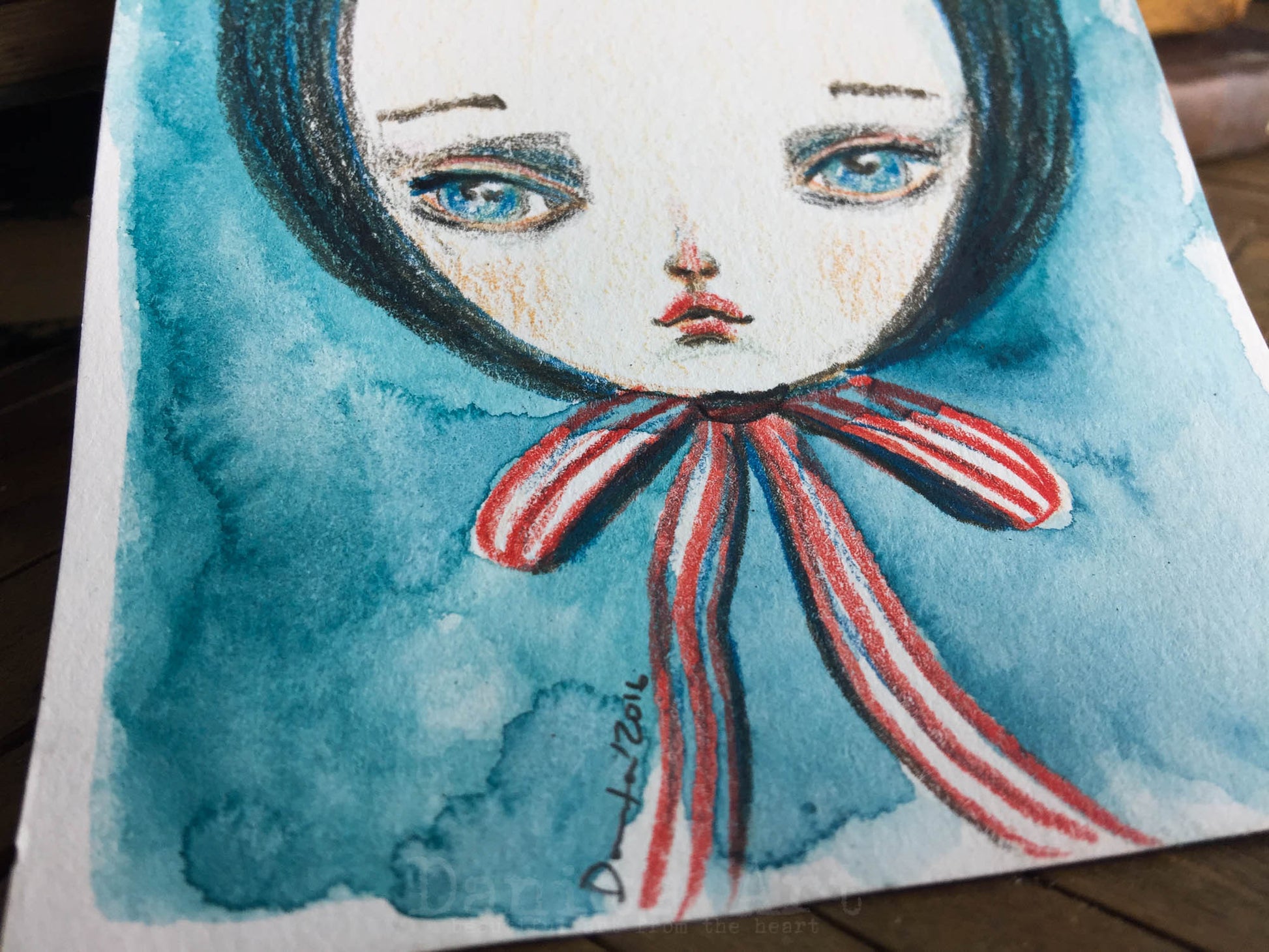 Study of a girl with a red bow, watercolor on paper original by Danita.