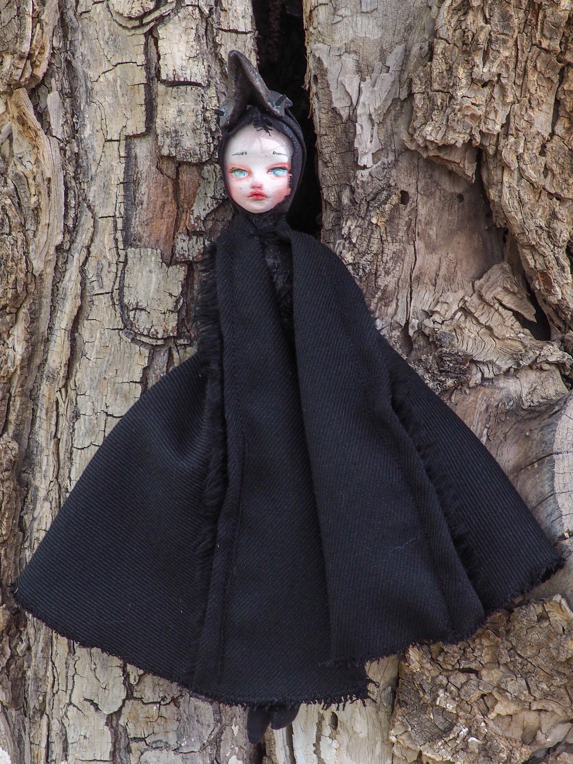 THE PLAGUE DOCTOR is a handmade Halloween art doll created by Danita Art. Using air dried clay, found fabrics and needle stitching for her body, Danita created an amazing original piece of work.
