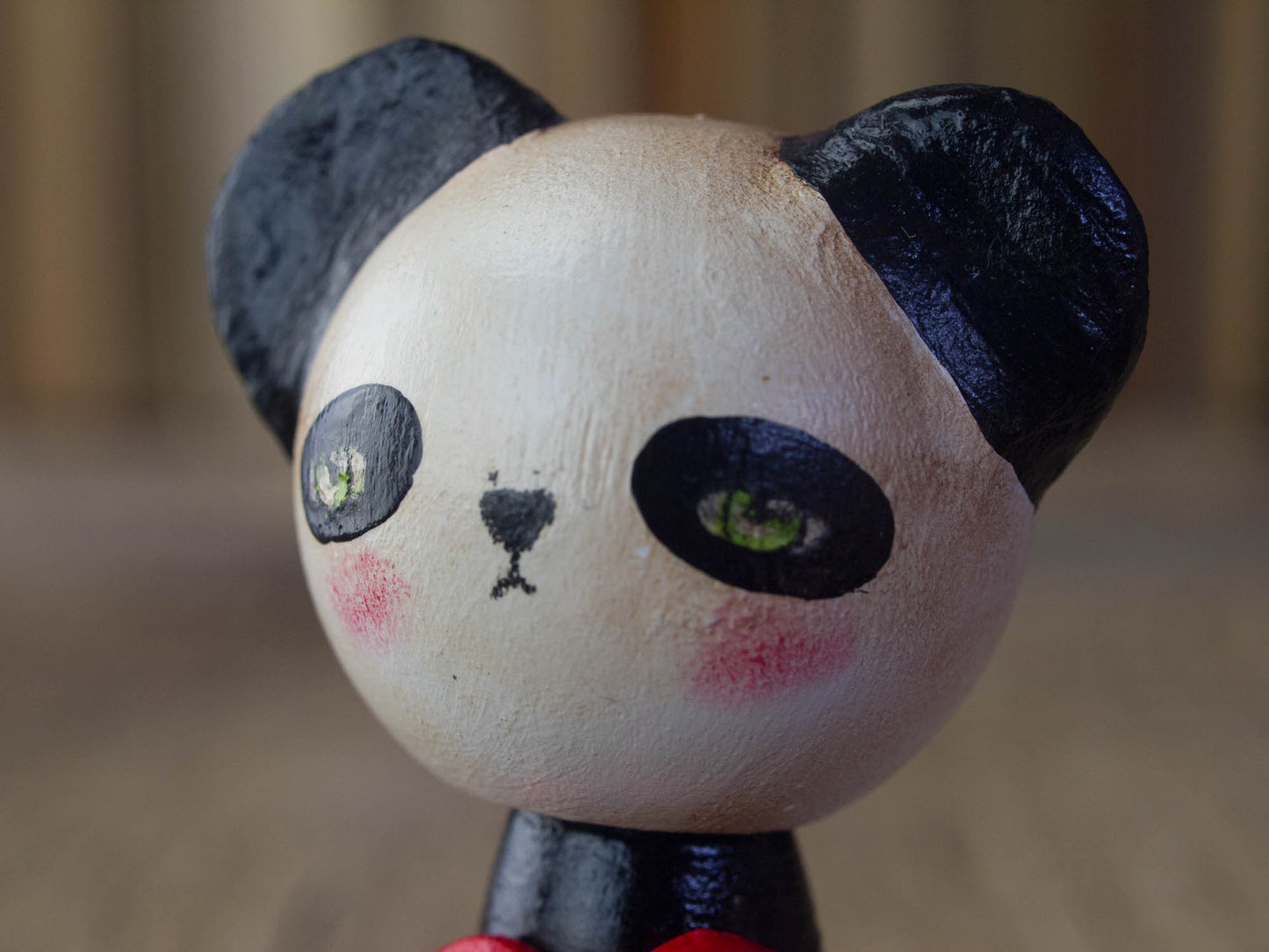 A beautiful panda woodland creature kokeshi art doll, handmade by Danita Art.