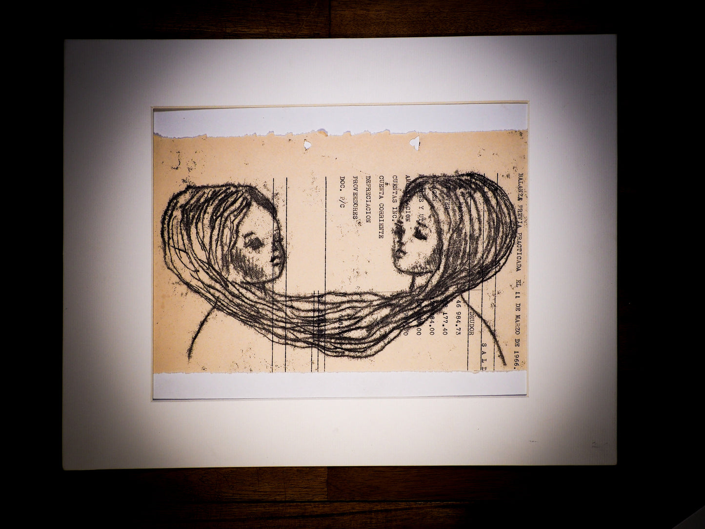 An original watercolor painting by Idania Salcido, the artist behind Danita Art.  This is a beautiful monoprint, a one of a kind ink and vintage paper original art creation depicting two girls whose memories are tied by their hairs in a very surreal piece, painted on a mid 20th century ledger sheet with typewriter characters.