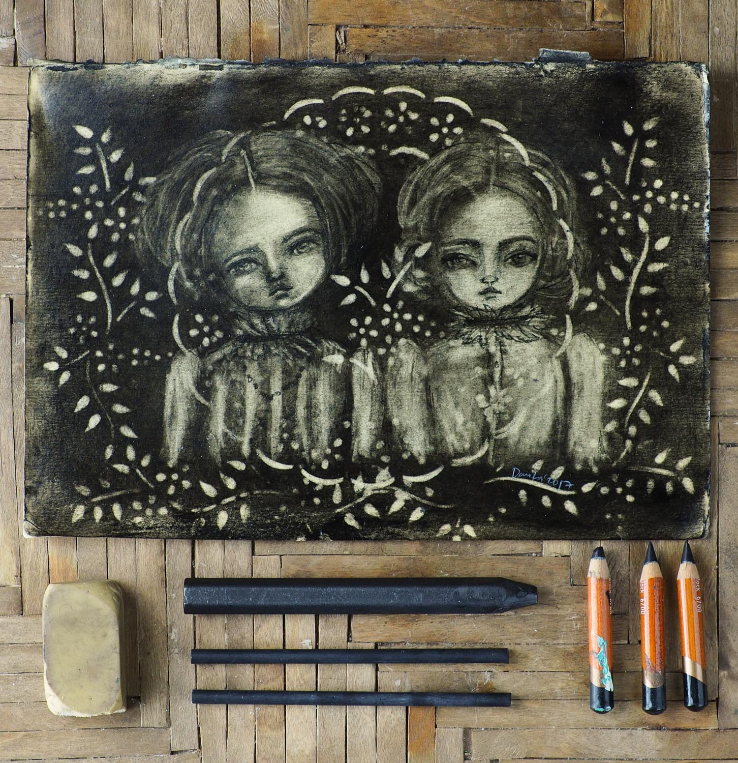 A beautiful drawing on a vintage book page by Danita Art. Created using charcoal and graphite pencils, dark pastels and graphite blocks. Mixed media original illustration.