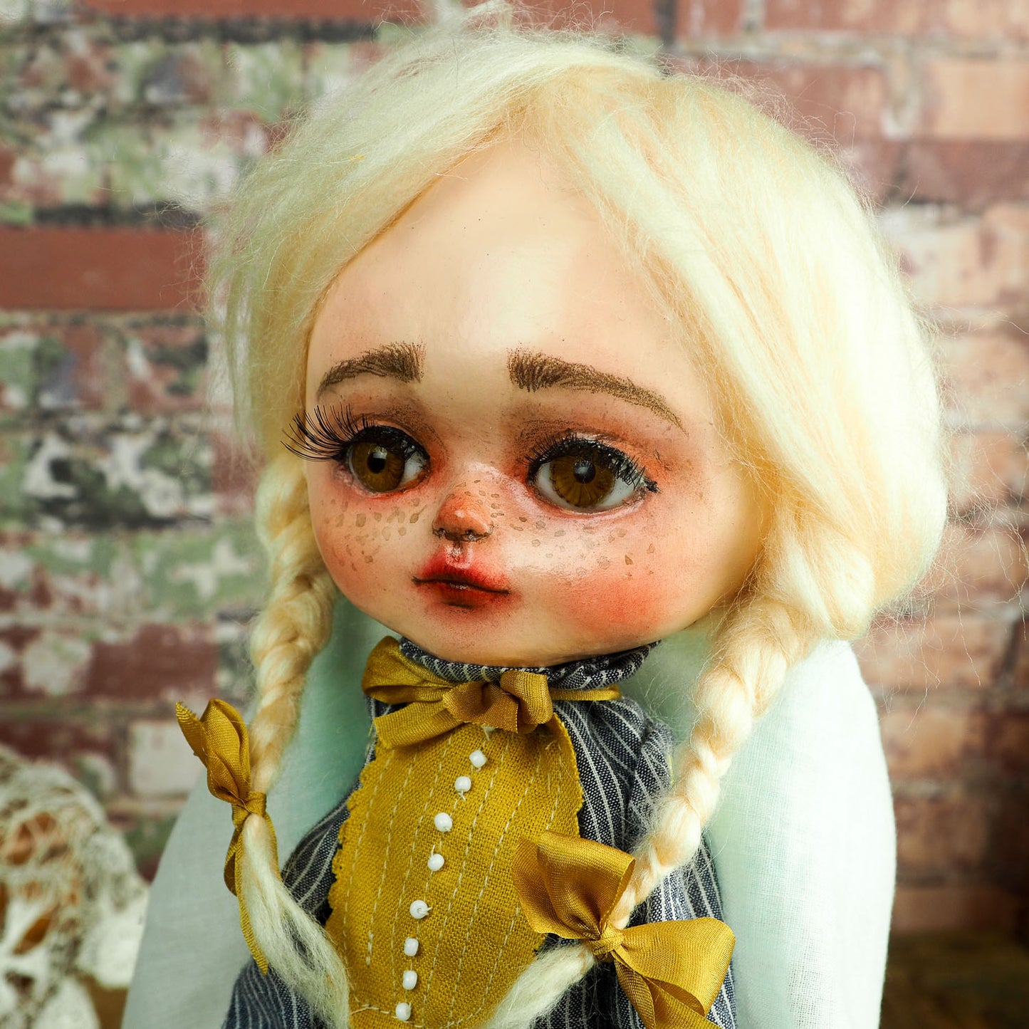 An original hand crafted art doll made by Danita. A blonde girl with a love for music, she plays her vintage vinyl records on her antique gramophone.