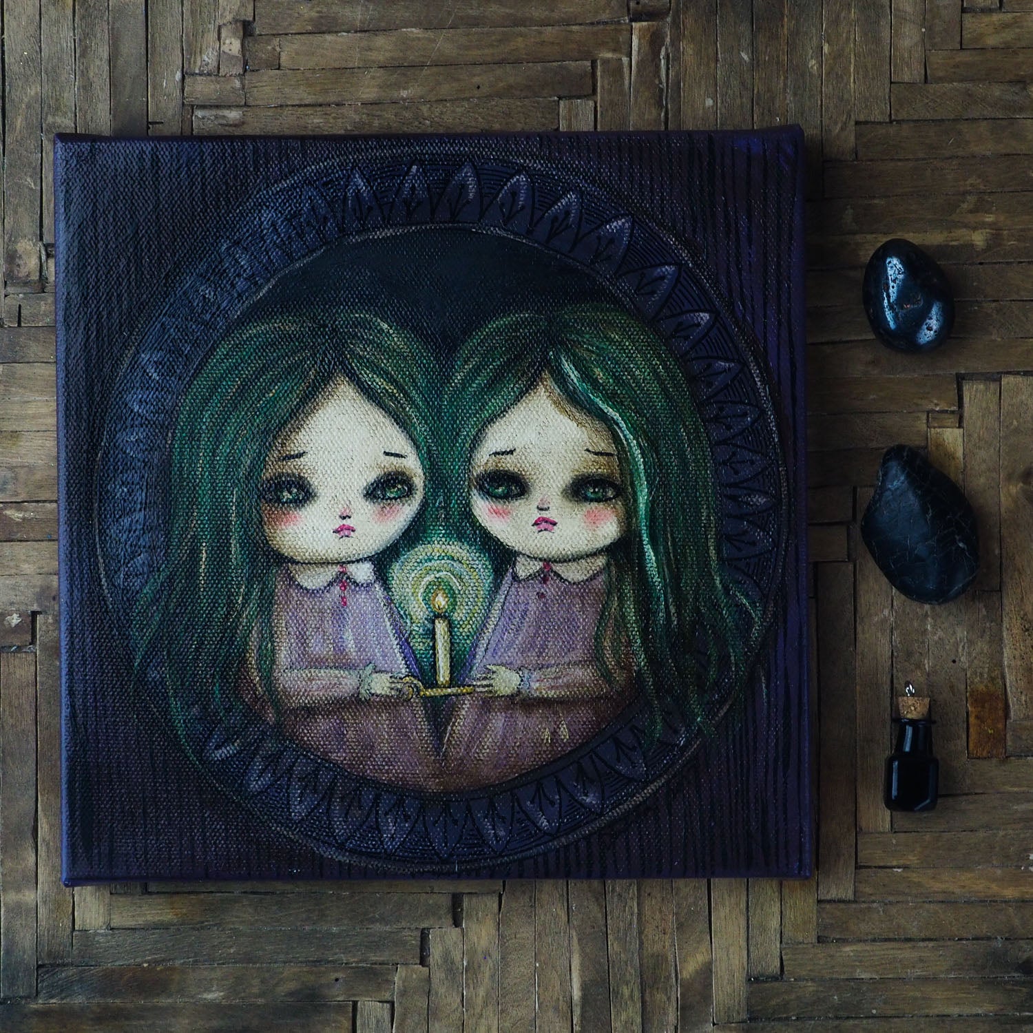 Sisters by candle light: An original mixed media painting by Danita. Mystery and horror mix in a whimsical image of two sisters exploring a haunted mansion by candlelight. Made with acrylics, oils, pencils, graphite and more over a stretched canvas.