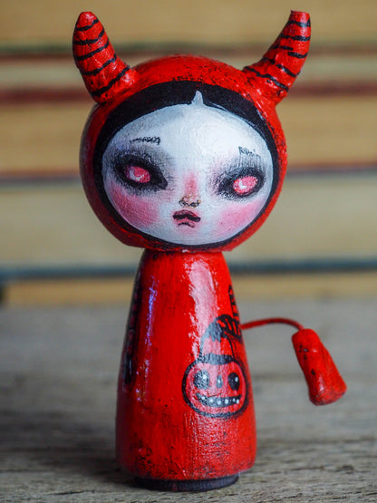 Danita original wooden kokeshi art doll. Home decor Halloween red devil girl mini figurine, perfect to decorate desks and shelves. Collectible items from Danita!