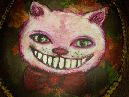 Alice's constant companion on her adventures, the Cheshire Cat is constantly appearing and disappearing when Alice least expects it, and he is grinning a smile without a cat on this painting inspired by Wonderland, created by Danita.