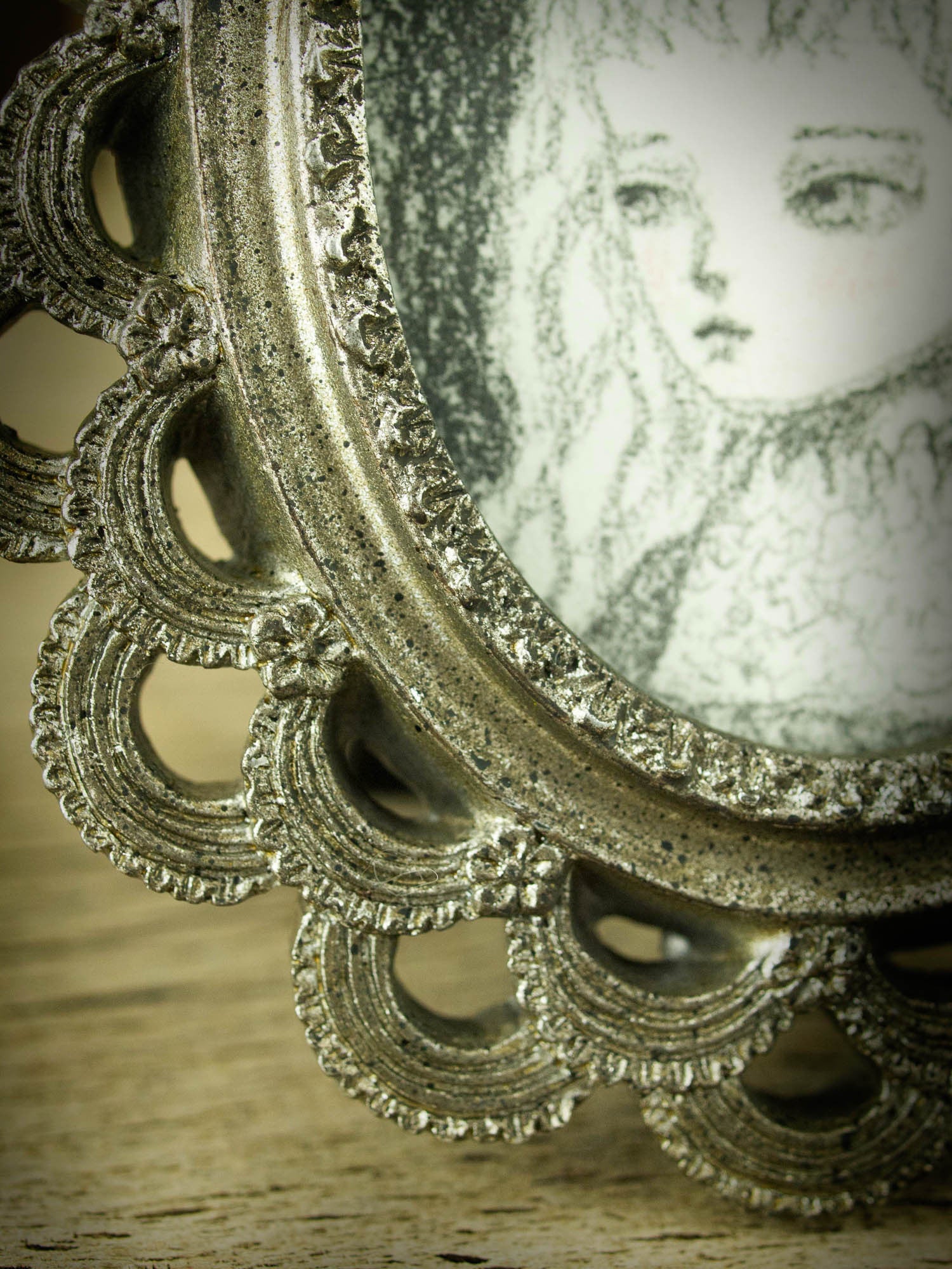 This is a very simple drawing in pencil by Danita Art, with just a little bit of rouge red on her cheeks. I love the vintage style of the image, and the little frame that comes with it it's just perfect for her.