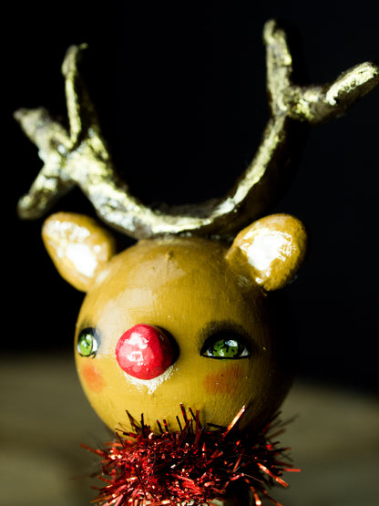 Rudolph the red nosed reindeer, a holiday wood kokeshi art doll created by Danita Art