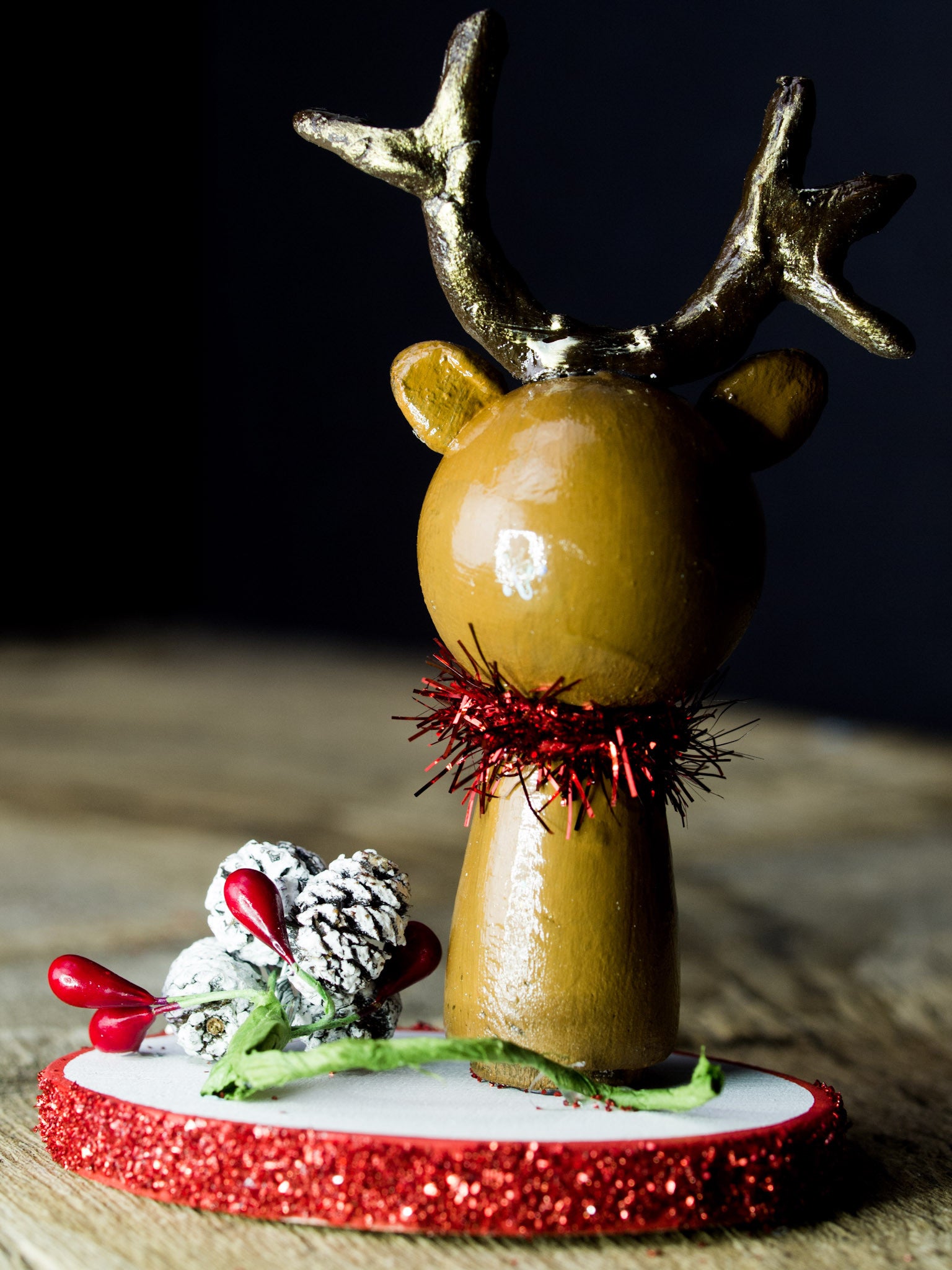 Rudolph the red nosed reindeer, a holiday wood kokeshi art doll created by Danita Art