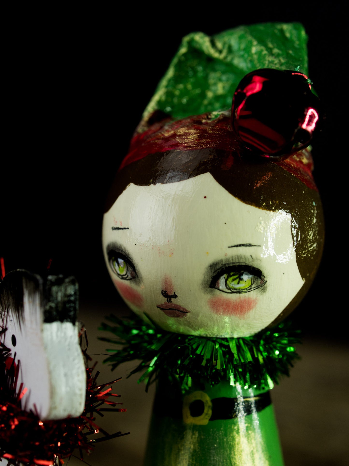 Santa's little helper, a holiday wood kokeshi art doll created by Danita Art