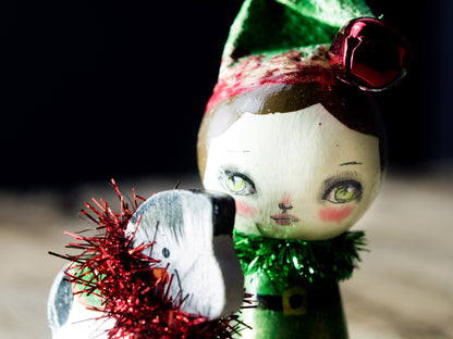 Santa's little helper, a holiday wood kokeshi art doll created by Danita Art