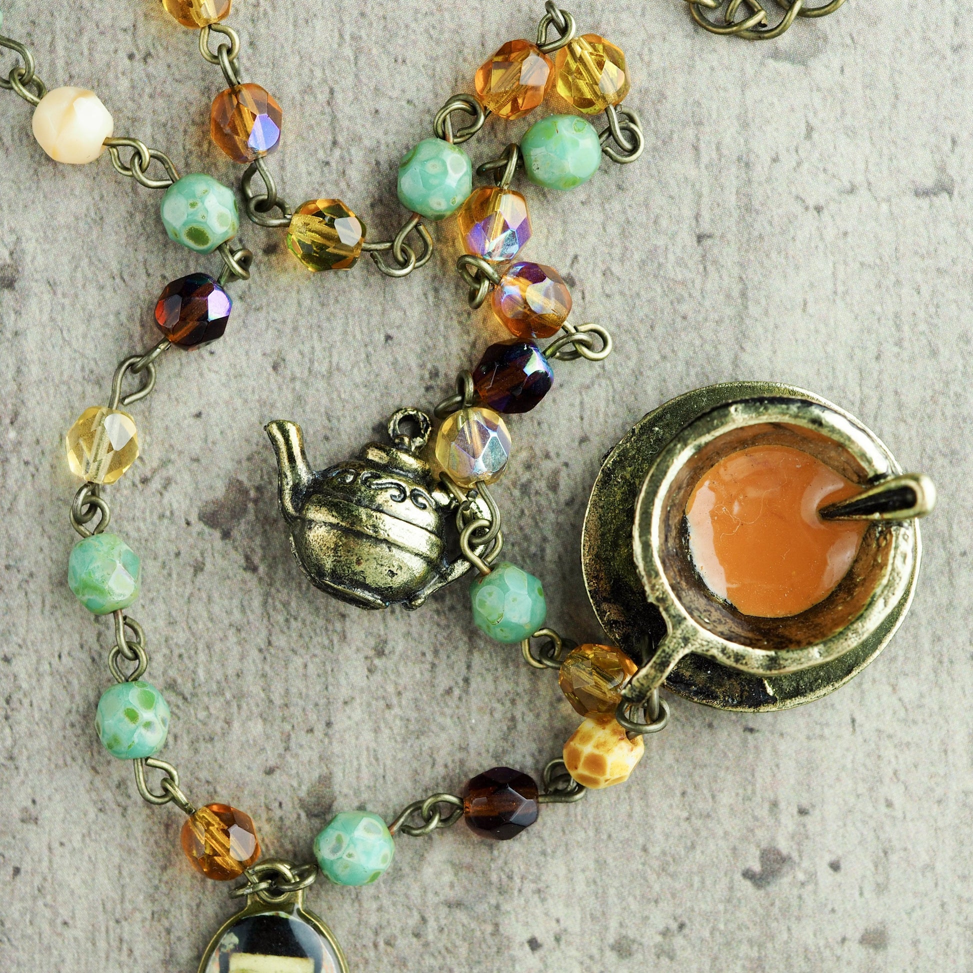 Original mixed materials necklace by Danita Art. The Tea Fairy, a whimsical mixed media illustration.