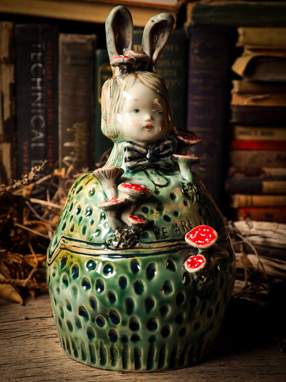 Alice the rabbit vintage ceramic figure inspired by Alice in Wonderland made by Idania Salcido, the mixed media artist and ceramist behind Danita Art. Earth clay is hand sculpted and glazed and kiln fired to create a ceramic home decor heirloom figurine. Each unique art piece is a one of a kind fine pottery artwork.