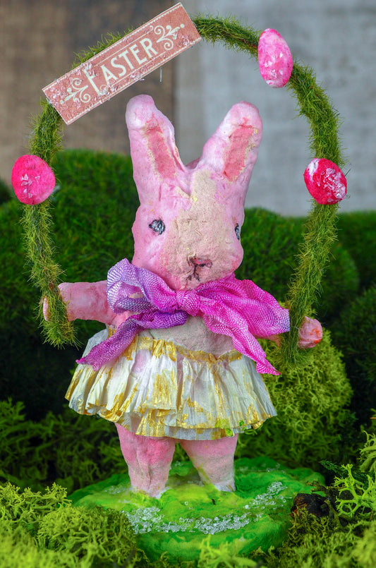 Spring always inspires Danita to make beautiful handmade decorations for when the flowers start to bloom, just like this 4" spun cotton handmade pink Easter bunny rabbit art doll by Danita, hand painted and dressed in a hand painted polka dot paper skirt.