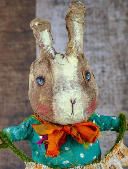 Spring always inspires Danita to make beautiful handmade decorations for when the flowers start to bloom, just like this 10" spun cotton handmade Easter bunny rabbit art doll by Danita, hand painted and dressed in a blue polka dot shirt and striped pants.