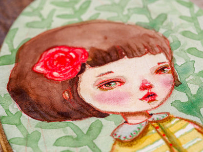Continuing with Danita's series of watercolor portraits in wood, I painted this beautiful brunette with a red rose in her hair.  The painting measures 5 x 3 inches on a wood panel, painted using saturated watercolor pigments and my signature melancholic eyes on her face.  She has a friend you can adopt too!