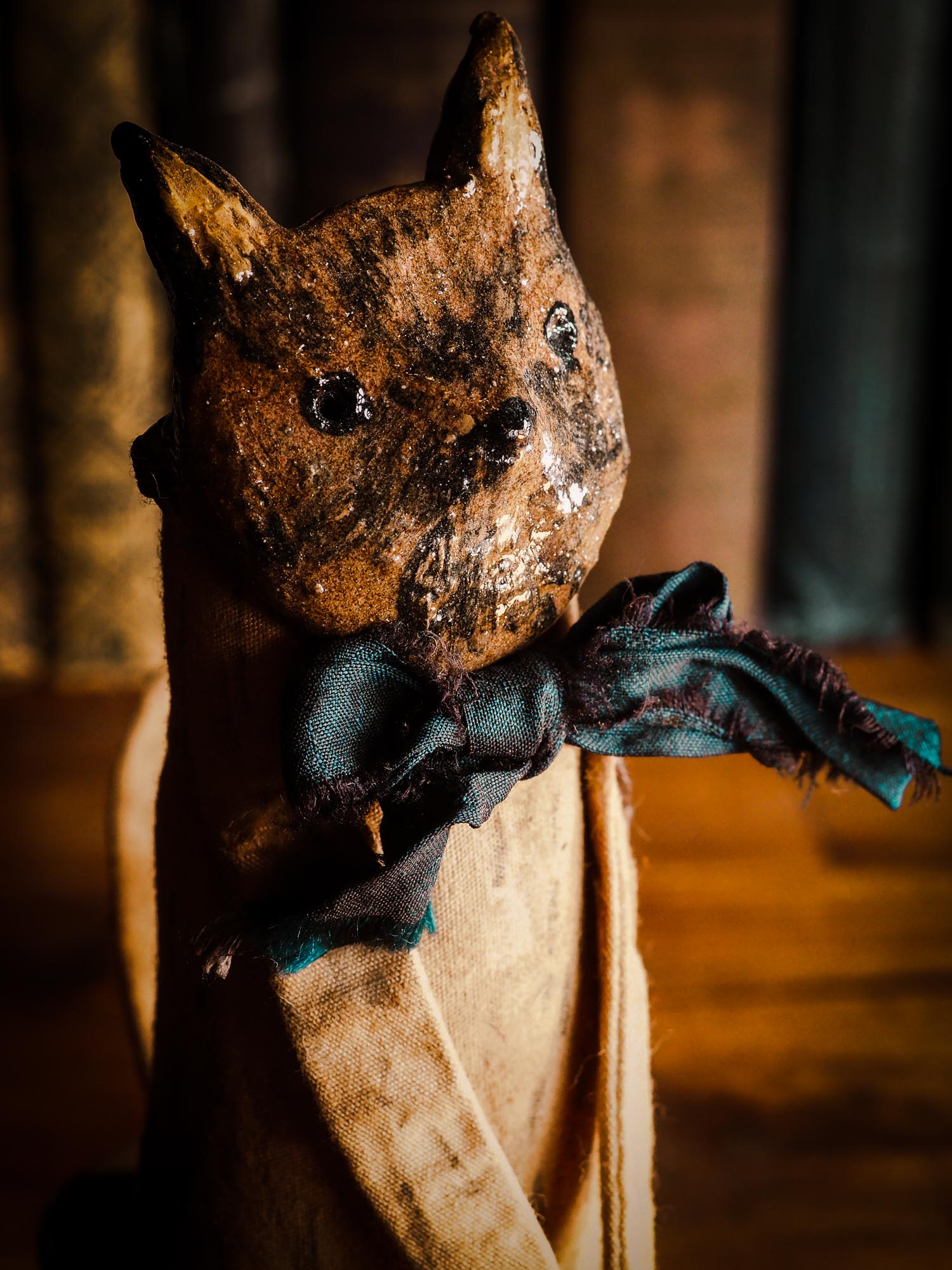 Woodlands wolf Soft sculpture art doll by Idania Salcido Danita Art with a Handmade ceramics face, organic dyed fabric and silk bow