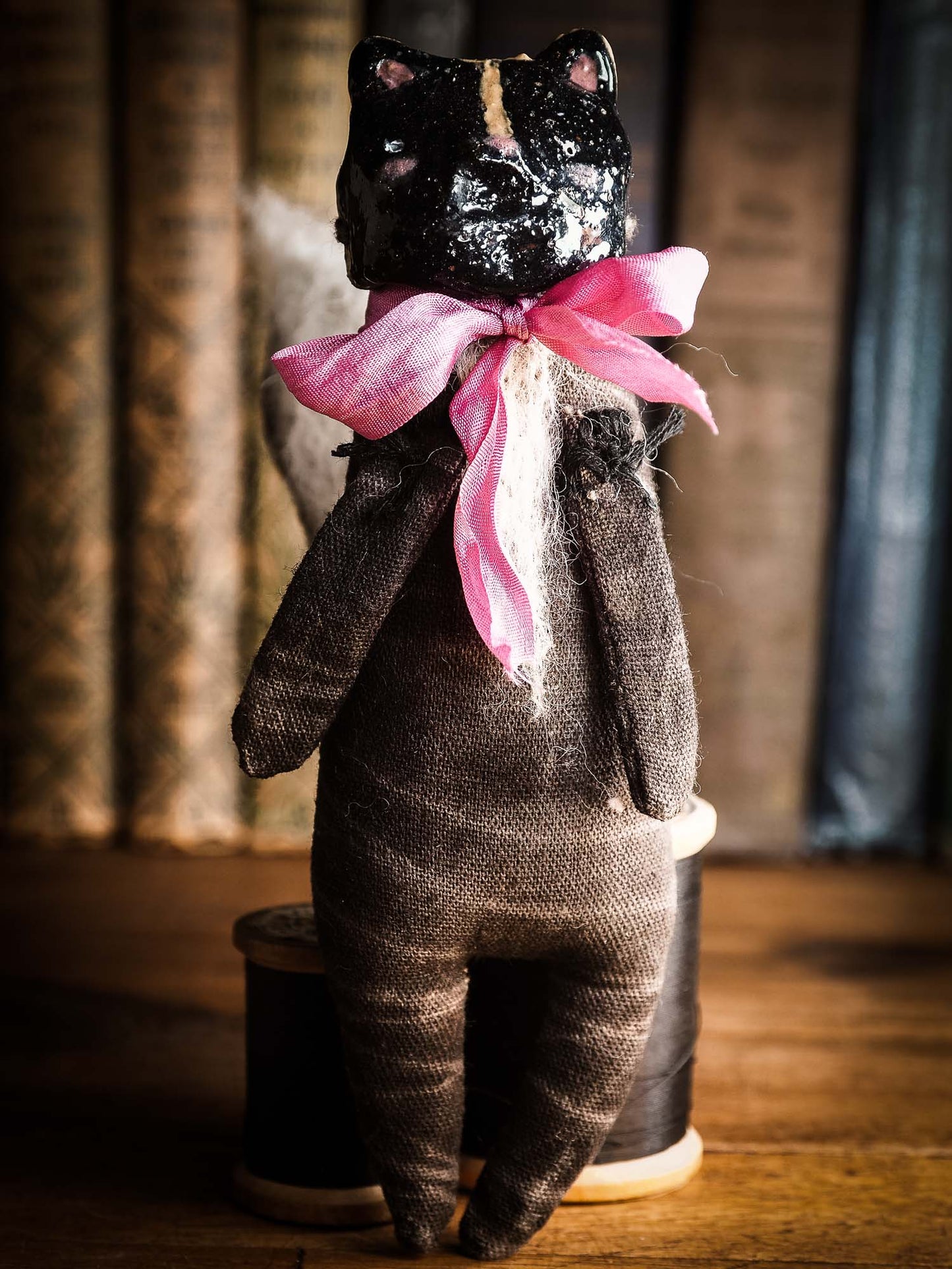 Skunk Toy Woodlands Soft sculpture art doll by Idania Salcido Danita Art with a Handmade ceramics face, organic dyed fabric and silk bow