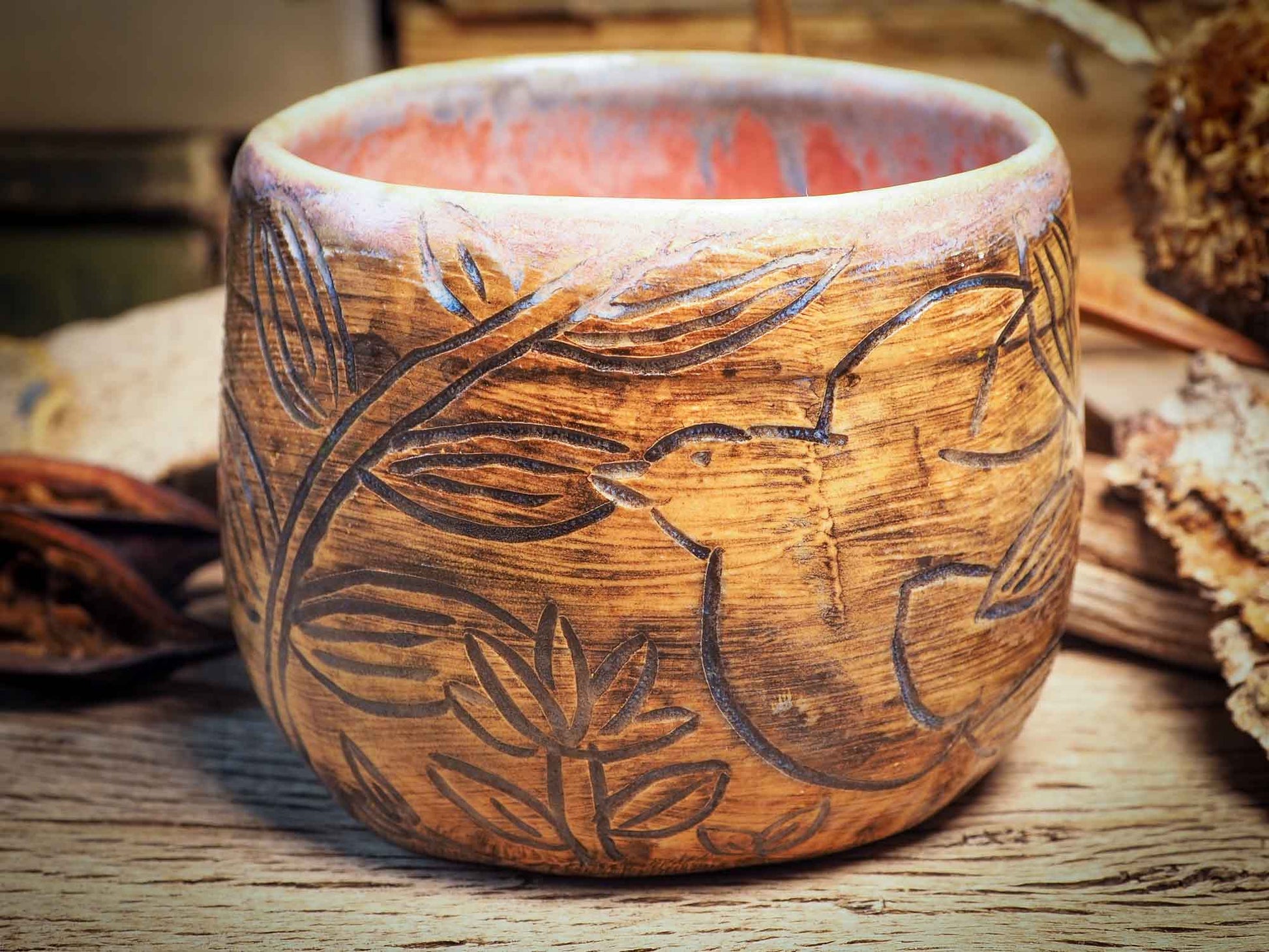This handmade carved ceramic coffee mug was created by me, Idania Salcido, the artist behind Danita Art, and fired and glazed on my own kiln. The inside is a beautiful combination of pink and blue glazes, swirling and combining inside like cream and coffee. Carved birds fly over a field, free and going far, far away.