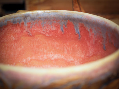 This handmade carved ceramic coffee mug was created by me, Idania Salcido, the artist behind Danita Art, and fired and glazed on my own kiln. The inside is a beautiful combination of pink and blue glazes, swirling and combining inside like cream and coffee. Carved birds fly over a field, free and going far, far away.