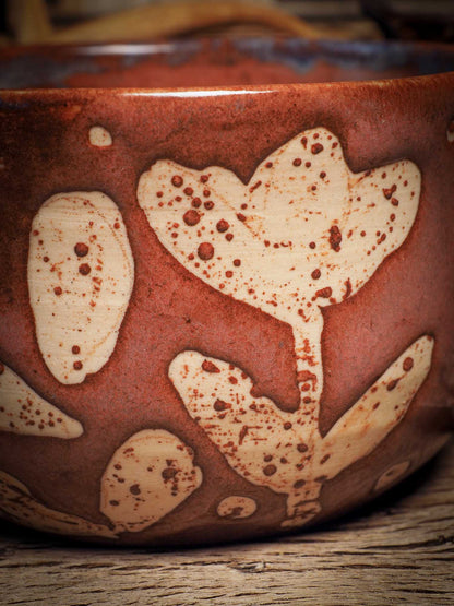 Handmade carved ceramic coffee mug created by Idania Salcido, the artist behind Danita Art, and fired and glazed on my own kiln. The inside is a beautiful combination of brown and blue glazes, combining inside like cream and coffee. A bunny rabbit on the handle and flowers on the sides make it a unique item decoration.