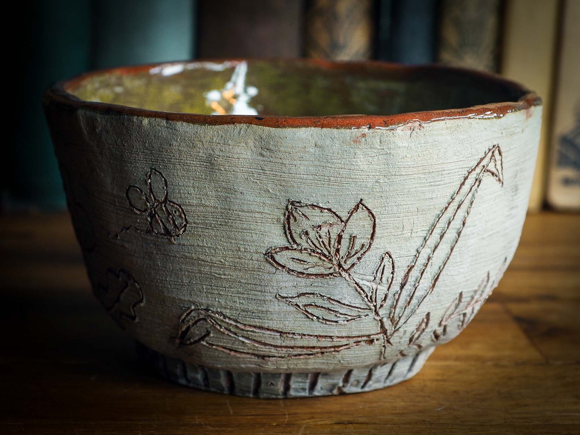 An original Idania Salcido Danita Art pinched ceramic cat pet food bowl. Handmade from locally foraged clay, this glazed ceramics one of a kind artwork is perfect for any kitchen plate and bowls unique collection. Thumbprints and  intentionally irregular shape give the bowl a cozy, warmly familiar feel when you pick it