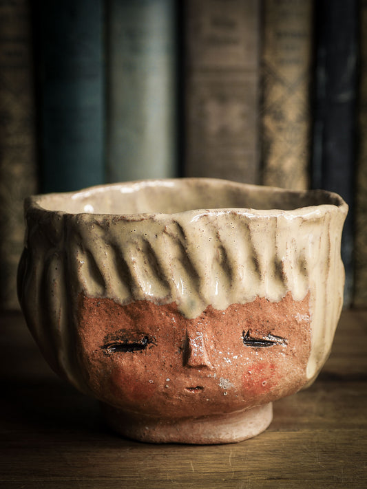 An original Idania Salcido Danita Art pinched ceramic cat pet food bowl. Handmade from locally foraged clay, this glazed ceramics one of a kind artwork is perfect for any kitchen plate and bowls unique collection. Thumbprints and  intentionally irregular shape give the bowl a cozy, warmly familiar feel when you pick it. This bowl has one of Danita'sa famous painting and doll faces on it. Perfect for your home!