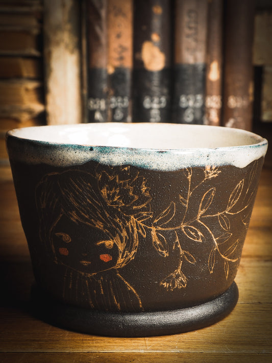 An original Idania Salcido Danita Art ceramic cat pet food plate. Handmade from stoneware, this glazed ceramics one of a kind artwork is perfect for any kitchen plate and bowls unique collection. Thumbprints and  intentionally irregular shape give the bowl a cozy, warmly familiar feel when you pick it. I LOVE This piece, with it's golden drawings and it's deep black chocolate brown color contrasting with the icy white glaze on top.