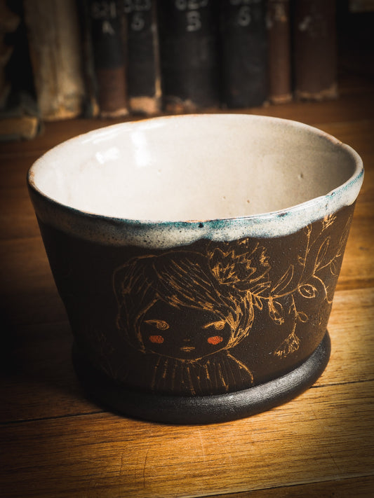 An original Idania Salcido Danita Art ceramic cat pet food plate. Handmade from stoneware, this glazed ceramics one of a kind artwork is perfect for any kitchen plate and bowls unique collection. Thumbprints and  intentionally irregular shape give the bowl a cozy, warmly familiar feel when you pick it. I LOVE This piece, with it's golden drawings and it's deep black chocolate brown color contrasting with the icy white glaze on top.