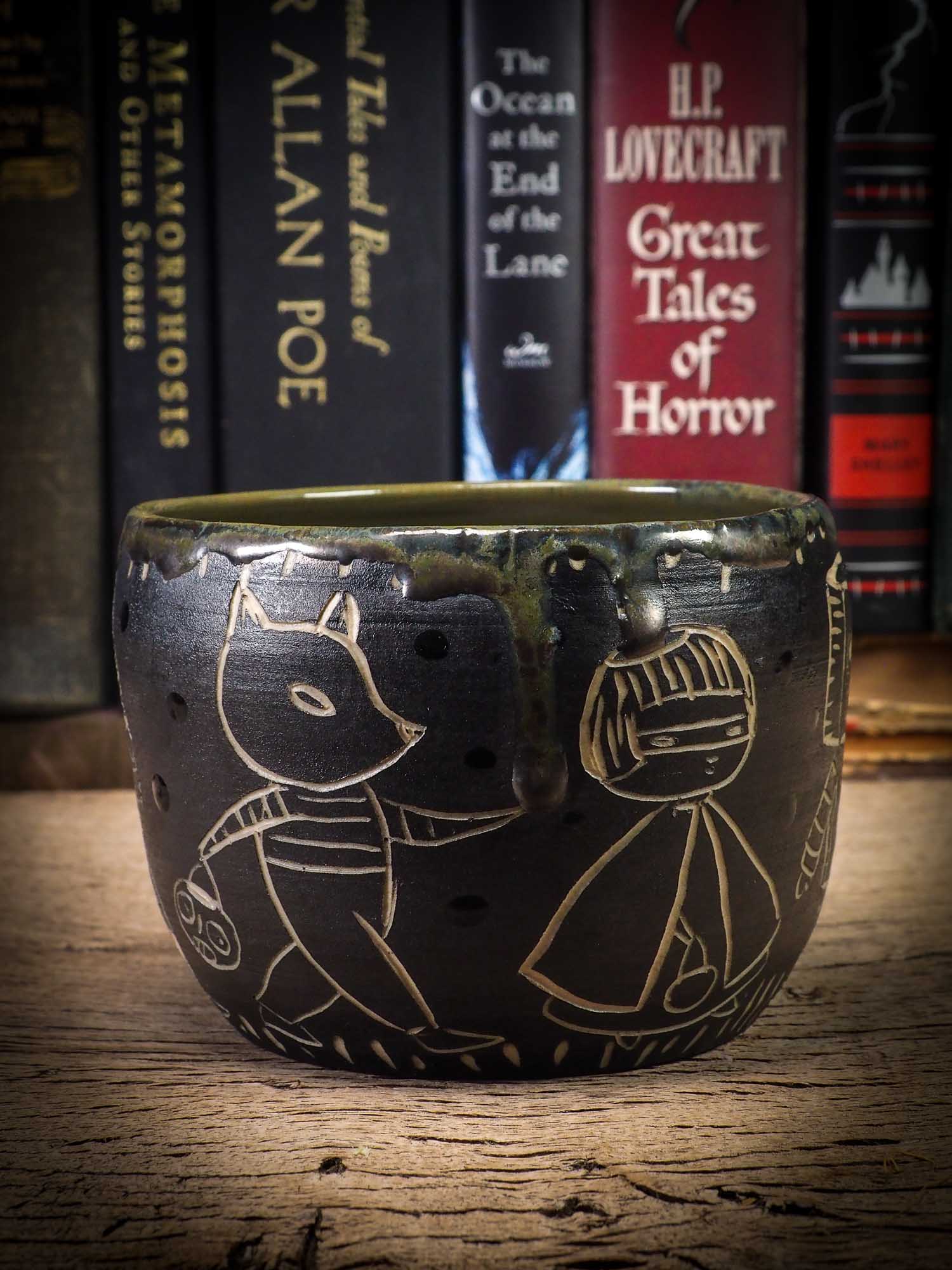 An original Halloween ceramic bowl by Idania Salcido, the artist behind Danita Art. Measures 4 x 4 x 3 Inches, made with wheel thrown clay, hand carved and glazed by the artist. The carved figures give it a nice, folk art primitive feel to it. Perfect for Halloween Candy, ice cream and fruit and as pet cat bowl.