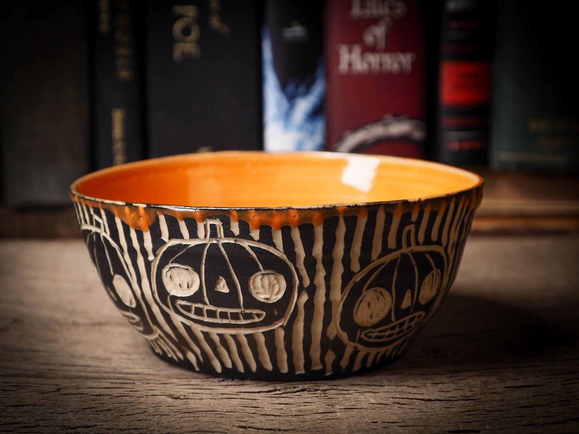 An original Halloween ceramic bowl bucket pail handmade by Idania Salcido the artist behind Danita Art. Made with wheel thrown clay hand carved and glazed by the artist. Witches, ghosts, goblins, black cats, vampires give a folk art primitive feel to it. Perfect for Halloween Candy, ice cream and fruit, a pet cat bowl.