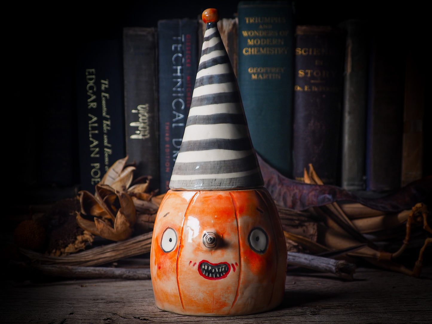 Fire glazed ceramic figurine by Idania Salcido, Danita Art. On Halloween, Danita creates spooky cute hand made ceramic figures to decorate your home in the scariest holiday of the year. Ghosts, witches, ghouls, vampires, black cats, pumpkins, jack-o-lantern and creatures of the night in glazed ceramic home decor.