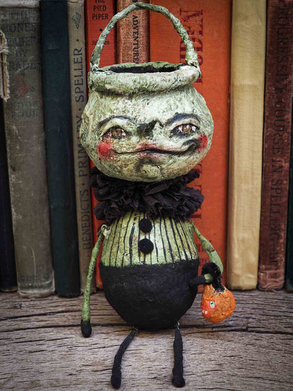 Handmade Halloween ornament posable doll by Danita. It is handmade using spun cotton and paper clay to make a whimsical Halloween home decor decoration