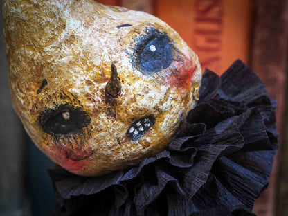 Danita Art thought about the Christmas carol story and decided to make a Halloween version with ghosts, ghouls, pumpkins, jack-o-lanterns, witches, cauldrons and more night creatures. This handmade art doll ornament for Christmas or Halloween trees is made with Spun cotton and paper clay,