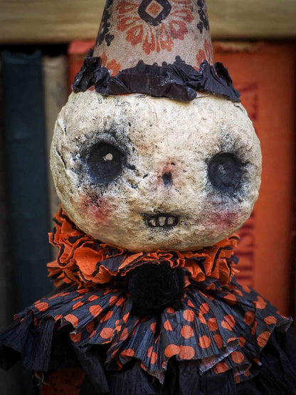 A Halloween carol is Danita's version of the tale of the three ghosts in A Christmas carol. Danita made handmade art dolls in spun cotton using ghouls, jack-o-lanterns, skeleton, witches, ghosts and more to create a visually inspiring set collection of Handmade dolls to create a beautiful Halloween story and home decor decoration.