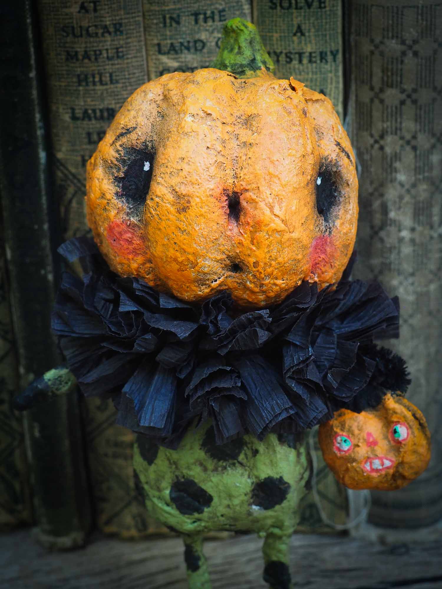 pumpkin jack-o-lantern ornament Halloween decoration. Danita art original handmade art doll pumpkin made with spun cotton from collection of witches, ghosts, skeletons, jack-o-lantern, pumpkin, vampire, ghouls and other whimsical folk art style home decor.