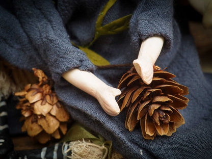 Original Danita Art handamde doll. Gaia mother nature is represented on this handmade figurine with pine cones, leaves and amazing details on her face and eyes. It is a perfect fantasy figurine gift.