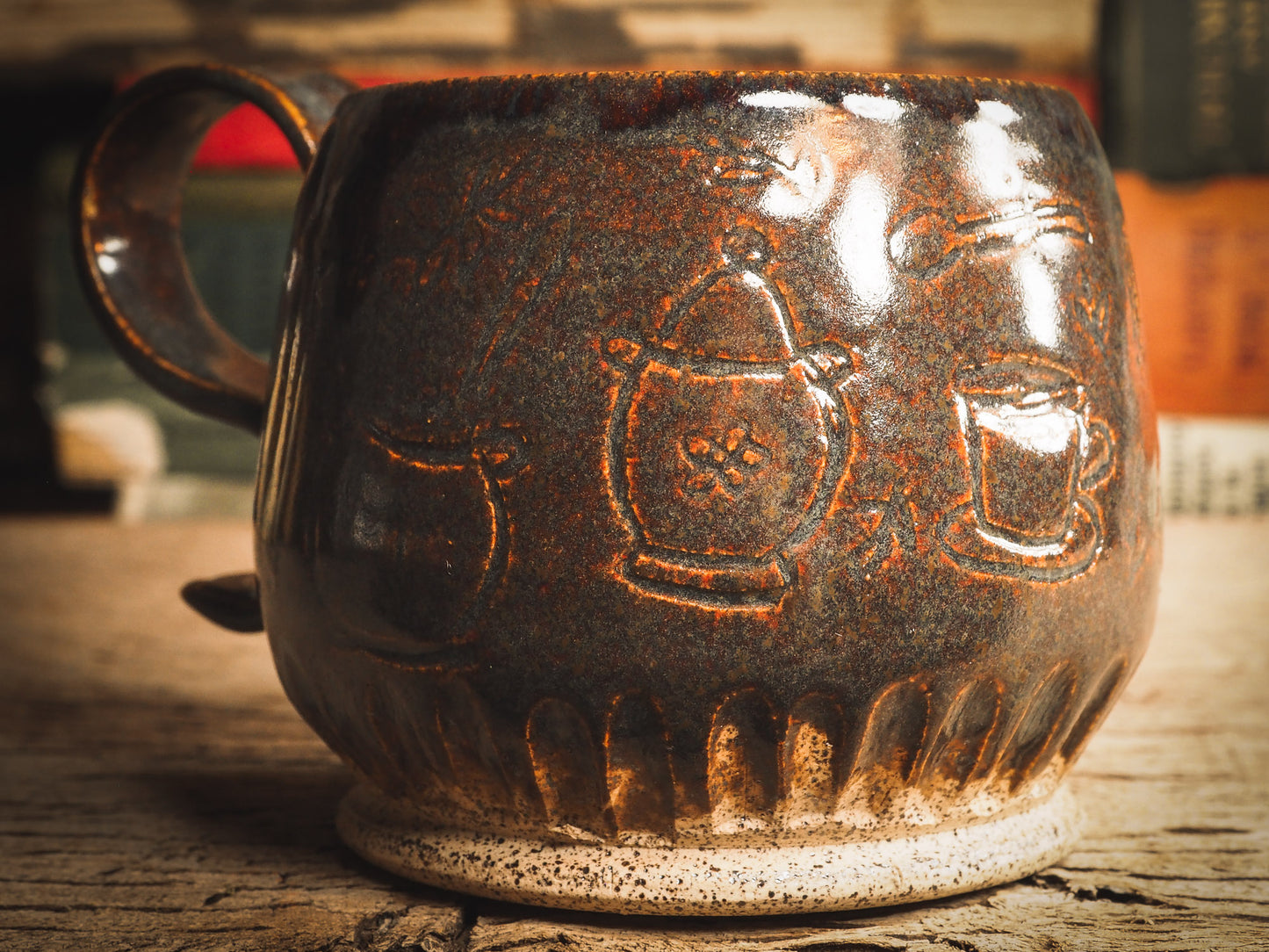 This super cute coffee mug has a little cat preparing his morning coffee carved on the sides of the mug and then glazed with beautiful earth tone glazes. An original ceramic coffee and tea mug by Idania Salcido, the artist behind Danita Art. It measures 3 x 3 x3 Inches, totally handmade in my studio. Food and drink safe, hand wash only.