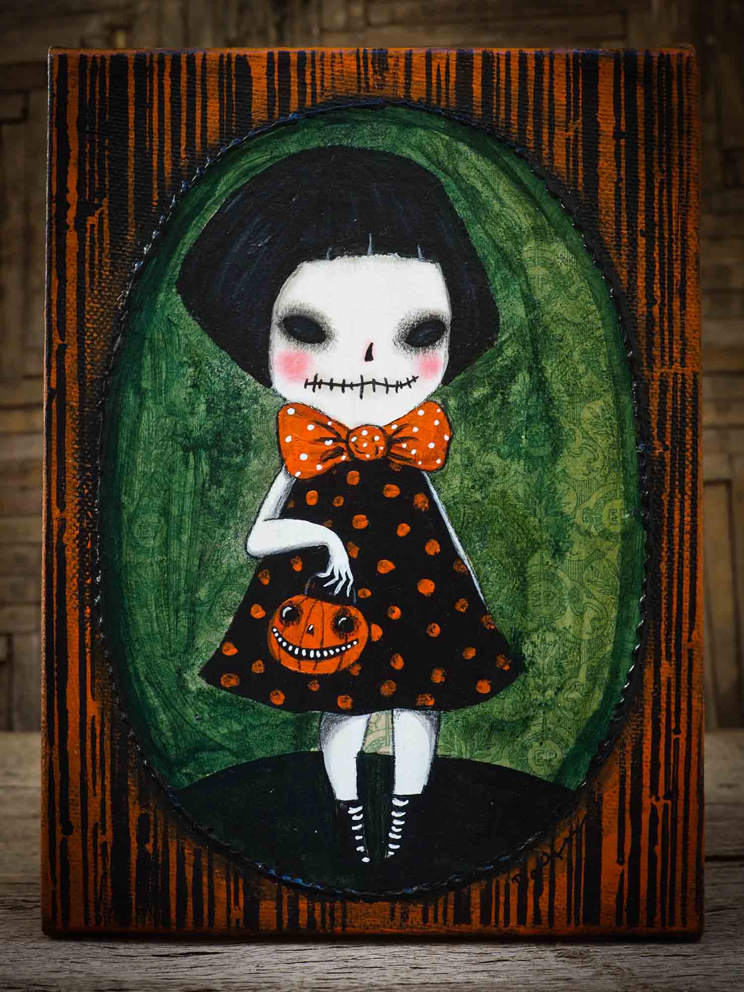 This whimsical zombie girl is an original Halloween painting by Danita Art. She is getting ready to go out trick-or-treat with her friends the wolves, the vampires, the witches, the ghouls and the ghosts.  Painted on canvas, even when she is a pale skinned zombie girl, she keeps the whimsical Danita eyes that you love so much.