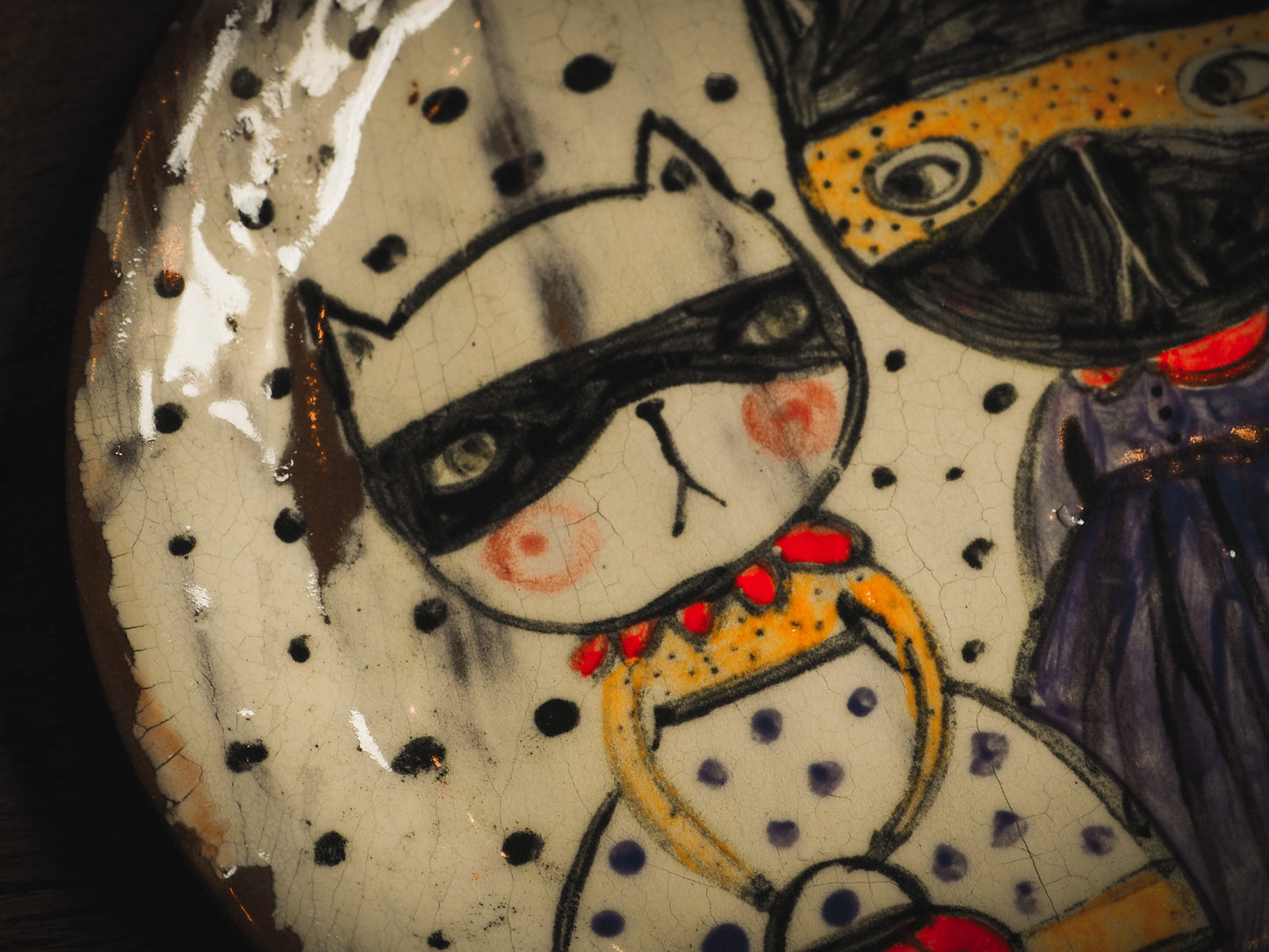 An original handmade Halloween ceramic dinner plate by Idania Salcido, Danita Art. Each plate is hand painted and glazed with pumpkins, witches, cats, jack-o-lanterns and moons. Made with fired glazed ceramics, this little witch, jack-o-lantern and cat plate is painted with delicate patterns that make it one of a kind artwork.