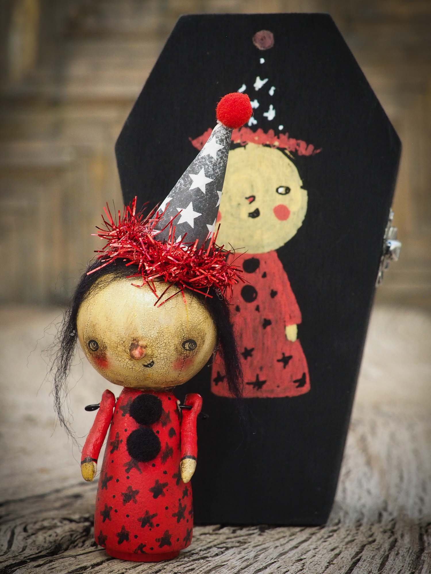 Folk art whimsical halloween witch mini kokeshi wooden style art dolls, designed and hand painted by non other that Danita Art, with painted body and wizard and witch clothes, adorable hand sculpted noses and a beautiful face with a whimsical smile. They come with a coffin shaped display and storage case for home decor