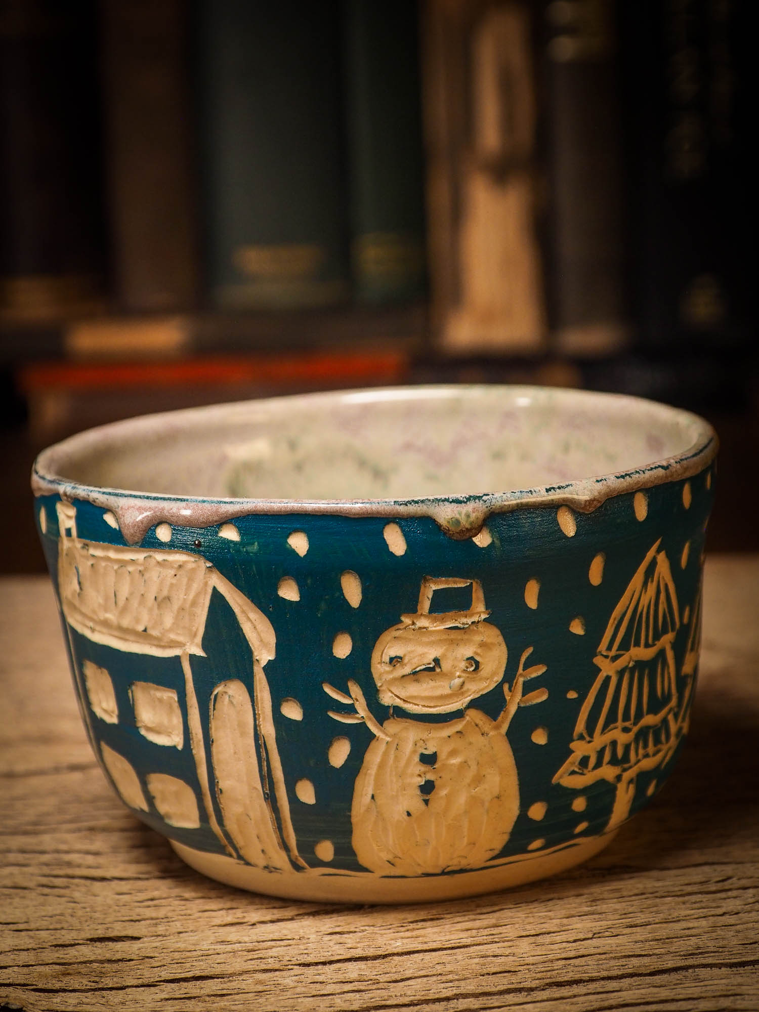 An original Christmas fire glazed ceramic handmade piece by Idania Salcido, the artist behind Danita Art. Glazed, carved sgraffito stoneware, hand painted and decorated, it is illustrated by hand with snowmen, Christmas trees, Santa Claus, angels and snow balls and winter themes.