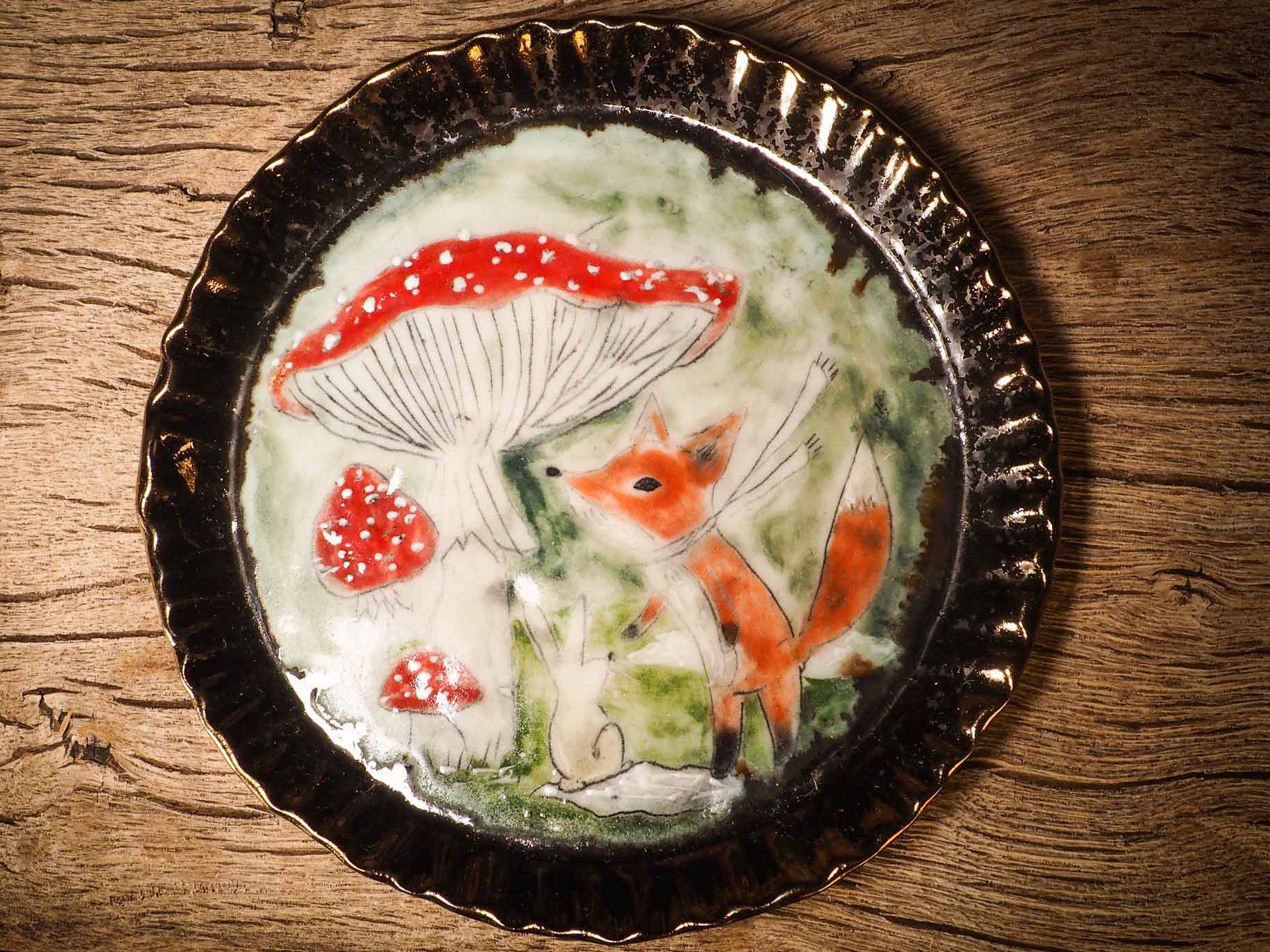 An original Christmas fire glazed ceramic handmade piece by Idania Salcido, the artist behind Danita Art. Glazed, carved sgraffito stoneware, hand painted and decorated, it is illustrated by hand with snowmen, Christmas trees, Santa Claus, angels and snow balls and winter themes.