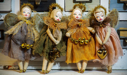 ou are looking at an original handmade Christmas tree ornament by Danita Art.  This beautiful holiday angel is completely hand crafted by Danita in her studio, using sculpted faces she paints by hand, giving each doll a unique personality.  The dress in this doll is hand dyed using natural pigments that Danita extracts from flowers, fruits and seeds, and they have a very organic and natural aged and distressed look.