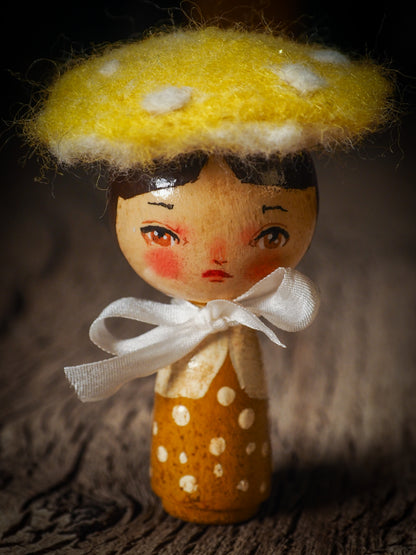 A beautiful collection of Mushroom dolls by Idania Salcido, the artist behind Danita Art. Each little wooden kokeshi doll is hand made by Danita Art with hand painted wood body, expressive and unique faces with a unique personality. Topped by a mushroom felted organic wool cap for a woodland feel to them.