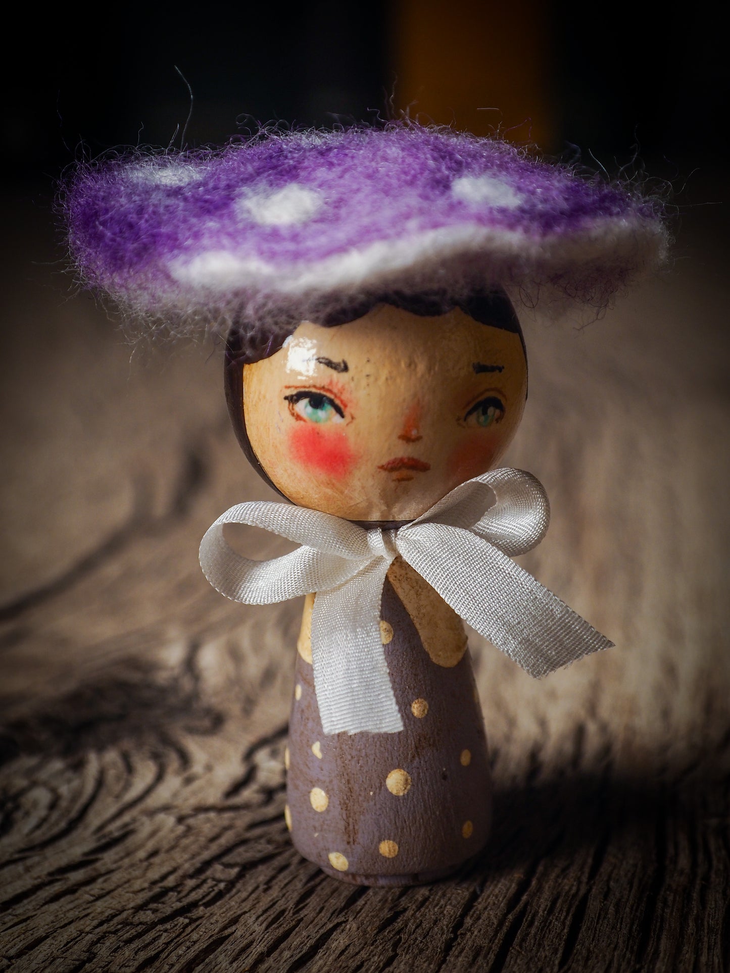 A beautiful collection of Mushroom dolls by Idania Salcido, the artist behind Danita Art. Each little wooden kokeshi doll is hand made by Danita Art with hand painted wood body, expressive and unique faces with a unique personality. Topped by a mushroom felted organic wool cap for a woodland feel to them.