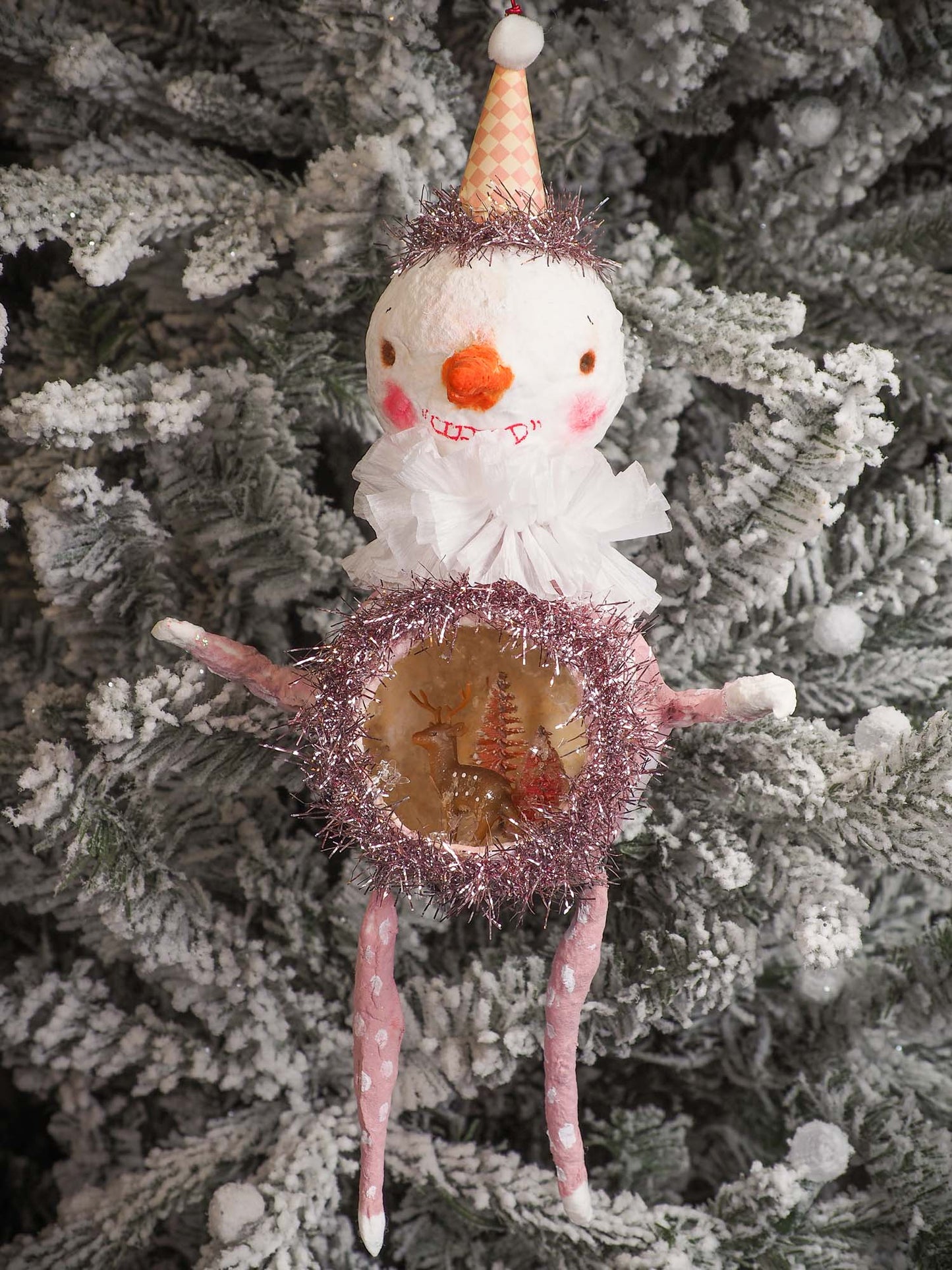 Adorable handmade spun cotton Art Doll Christmas tree ornament by Idania Salcido, the artist by Danita Art. Hand painted by the artist holiday figurine with paper hat with tinsel and vintage style garlands and a tiny Christmas tree. Hang this handmade ornament from your Christmas tree or use as Holiday decoration.